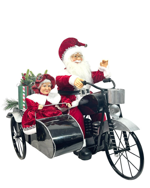 santa clauss con señora clauss en moto  70x77 cm