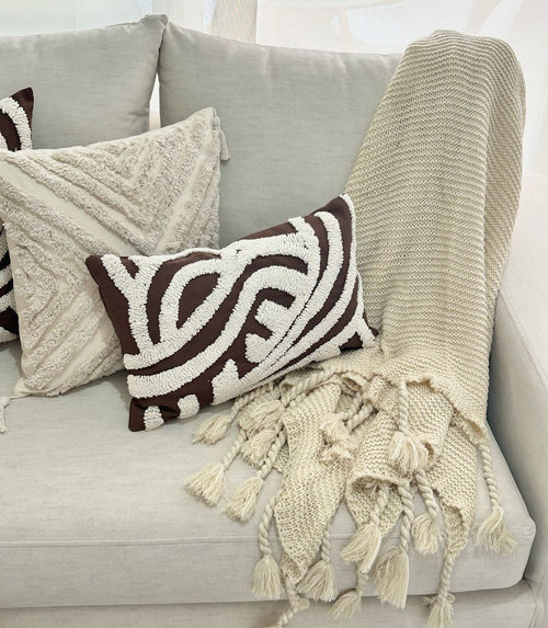 Manta fraza tejida beige  lazos 127x152 cm