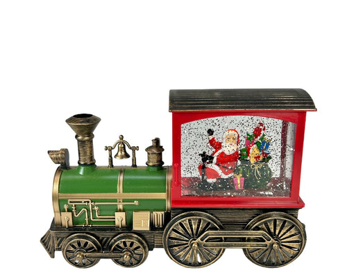 tren santa en pasta funciona  con luz musical y tambien con  3 pilas aa mide 28 cm de largo x 17 cm de ancho